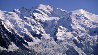 Snowy mountain plane blue sky - a mountain free wallpaper