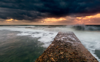 Pier ocean cloudy sky waves - a dark cloud free wallpaper