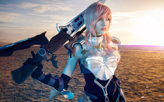 Futuristic woman sword desert beach - a futuristic outfit holding free wallpaper
