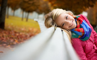 Pink coat woman park bench - a pink coat free wallpaper