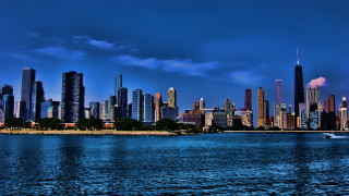 City skyline boat water matte - a boat in the foreground free wallpaper