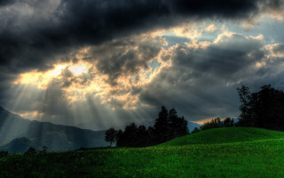 Green hill trees cloudy sky 3 - crepuscular free wallpaper for desktop