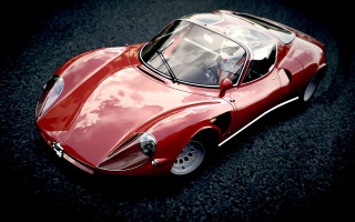 Red sports car pavement dark - realistic free wallpaper for desktop