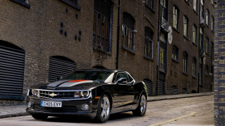 Black car street building red - the side of a street next free wallpaper