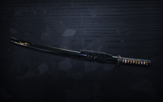 Black gold knife cobra sheathed - a black surface free wallpaper for desktop