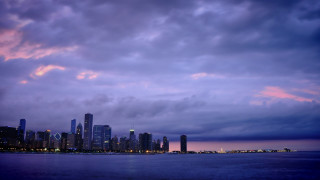 City skyline dusk water purple - a body of water in front free wallpaper