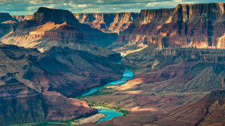 River canyon mountains clouds cityscape - a canyon free wallpaper
