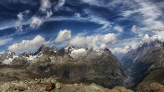 Mountain range clouds rocks panorama 2 - camille bouvagne free wallpaper