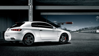 White car parking garage clock - a parking garage next free wallpaper