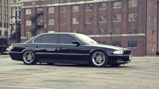 Black car parking lot fire - clean line free wallpaper for desktop