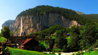 Mountain bridge forest house waterfall - a house in the foreground free wallpaper