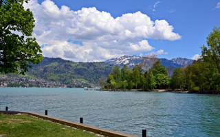 Lake mountain fence grassy scenery - a grassy area in the foreground free wallpaper