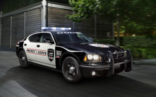 Police car night street flashing - a police car free wallpaper