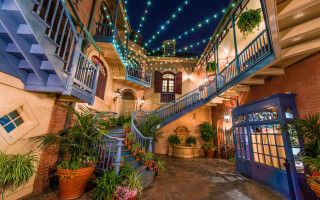 Enchanted cityscape blue door stairs - a staircase free wallpaper