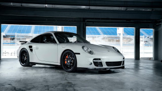White porsche garage blue sky - a football field free wallpaper