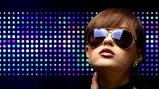 Eve rider sunglasses black dress - a blue light behind her free wallpaper