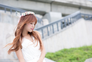 Woman red hair white dress 3 - a concrete wall free wallpaper