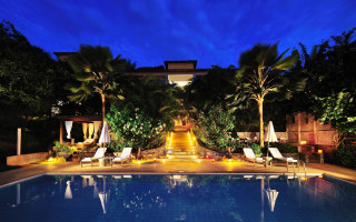 Night pool walkway buildings lights - a long walkway free wallpaper