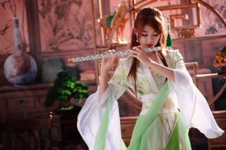 Woman green white dress flute - dress holding free wallpaper