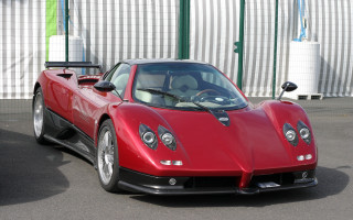 Red sports car parking lot 34 - gaudy free wallpaper