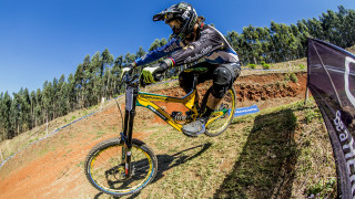 Man bike dirt road forest - a bike free wallpaper