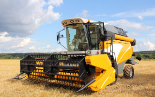 Yellow tractor wheat field precisionism - ready free wallpaper