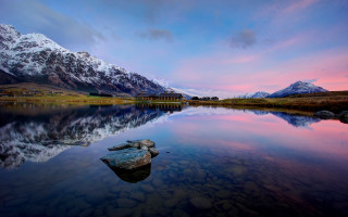 Mountain range reflection sunset lake 2 - a still lake free wallpaper