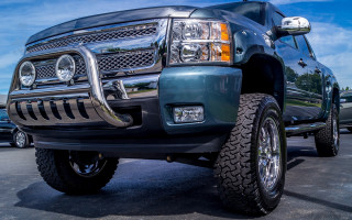 Large truck big tire parking 2 - chrome free wallpaper for desktop