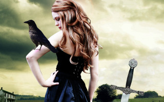 Woman black dress holding bird - a cloudy sky free wallpaper for desktop