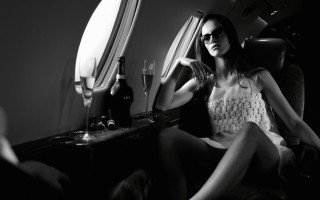 Woman sitting airplane wine luxury - a bottle of wine and a glass of wine free wallpaper