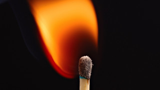 Matchstick lit flame dark background - the dark free wallpaper for desktop
