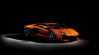 Orange sports car dark room 5 - nice looking orange sports car free wallpaper
