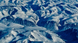 Mountain range snow ice water 2 - an airplane window free wallpaper