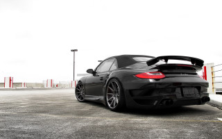 Black sports car red light 12 - a parking lot free wallpaper