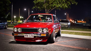 Red car night city street 2 - the side of a road free wallpaper for desktop