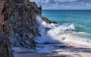 Wave cliffs beach surfing ocean - a surfer free wallpaper