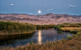 River mountain moon sky field - a moon in the sky above free wallpaper