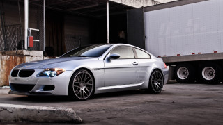 Silver car truck parking lot - a concrete wall free wallpaper