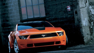 Bright orange sports car red - a red cross free wallpaper