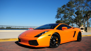 Bright orange sports car bridge 2 - orange sports car free wallpaper