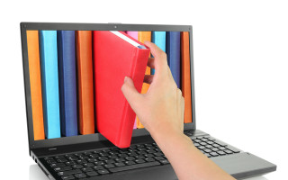 Person holding notebook laptop colorful - screen free wallpaper