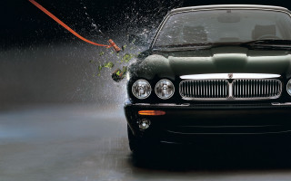 Car water spraying photorealism city - art green free wallpaper for desktop