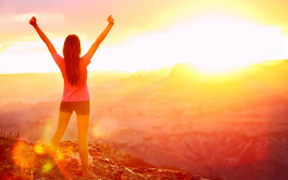 Mountain sunset woman arms raised - sunrise free wallpaper