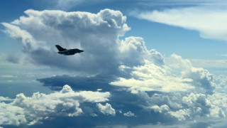 Jet clouds blue sky puzzle - a jet free wallpaper