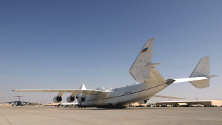 Large airplane tarmac airport plane - a large airplane free wallpaper