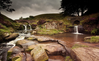 Small waterfall rocky stream bridge 2 - a green hillside free wallpaper