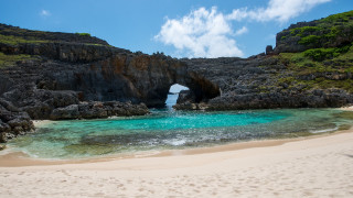 Beach rock arch lake ocean - the middle of it free wallpaper for desktop