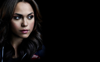 Woman longhair blackjacket seriousportrait cloisonnism - a black jacket free wallpaper