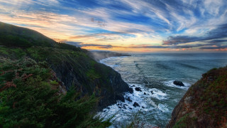 Cliff water sunset nature beautiful - a sunset in the background free wallpaper for desktop