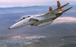 Fighterjet desert mountains city skyline - ed benedict free wallpaper